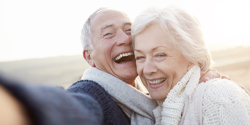 13583668 - hand pointing at a healthy living illustration on blue background.