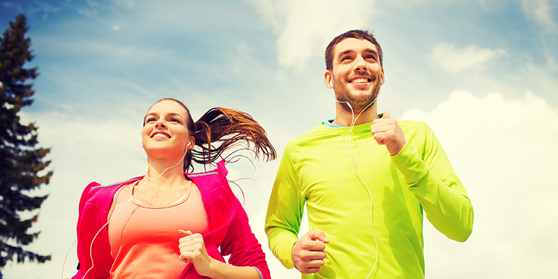 13583668 - hand pointing at a healthy living illustration on blue background.